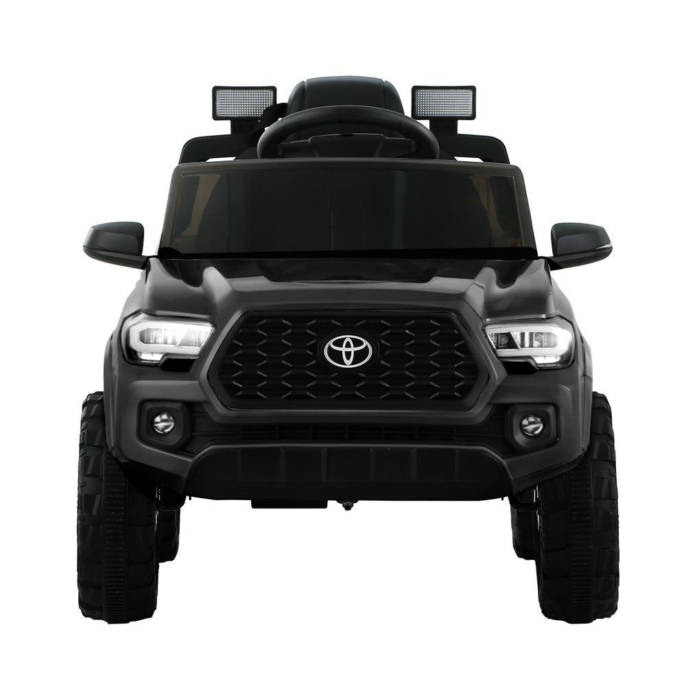Black kids ride-on Toyota Tacoma ute
